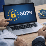 Бізнес-команда аналізує відповідність GDPR на ноутбуці в офісі з європейською символікою та акцентом на захист даних